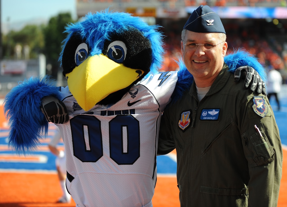 Col. Ron Buckley, 366th Fighter Wing commander, show his Air Force pride during the Air Force vs. Boise State University football game Oct. 22, 2012, in Boise, Idaho.  While he heads out to his new assignment he will always remain a Gunfighter! (U.S. Air Force photo/2nd Lt. David Liapis)
