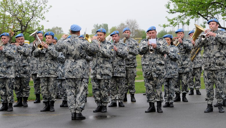 GRAF IGNATIEVO AIR FORCE BASE; Bulgaria -- A Bulgarian air force band plays the American national anthem during the Thracian Star 2012 opening ceremony April 18. Thracian Star 2012 is a month-long joint training exercise focused on building partnerships and increasing interoperability with the Bulgarian air force. While this is not the first time the Bulgarian air force has hosted American forces at Graf Ignatievo; Thracian Star 2012 boasts the largest contingent of Airmen to date they’ve hosted.; In all; the 31st FW brought more than two dozen F-16 Fighting Falcons and more than 500 Airmen—about twice the amount than any other U.S. Air Forces in Europe wing thus far. (U.S. Air Force photo/Senior Airman Katherine Windish)