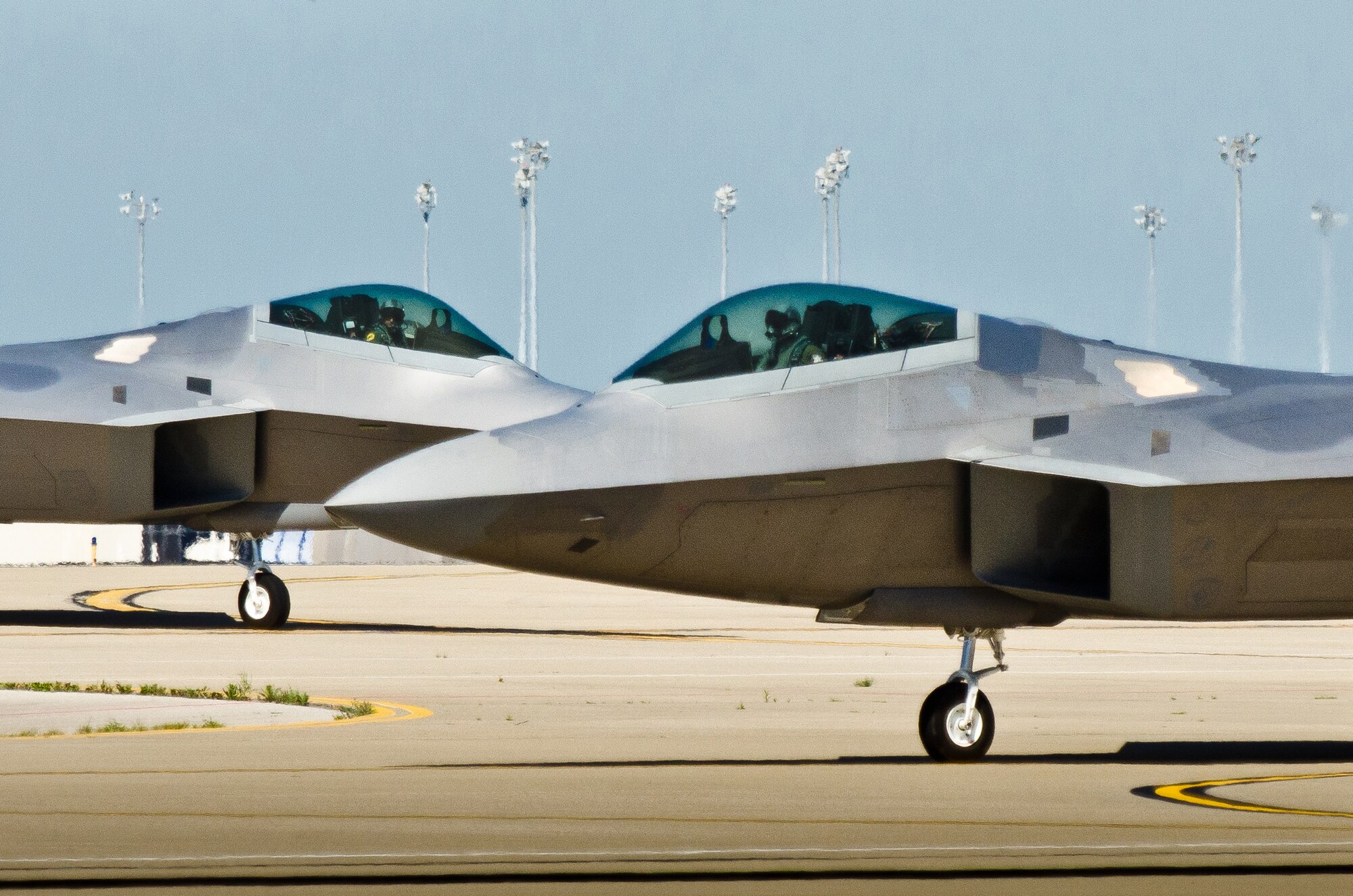 Two U.S. Air Force F-22 Raptor fighter jets taxi into the Kentucky Air National Guard Base in Louisville, Ky., on April 18, 2012, prior to this weekend's 22nd annual Thunder Over Louisville air show. The Raptor Demo Team, based at Langley Air Force Base, Va., will be one of the show's marquee events. The Kentucky Air Guard is once again supporting military aircraft for Thunder, which has grown to become one of the largest air shows in North America, organizers say. (U.S. Air Force Photo by Maj. Dale Greer)