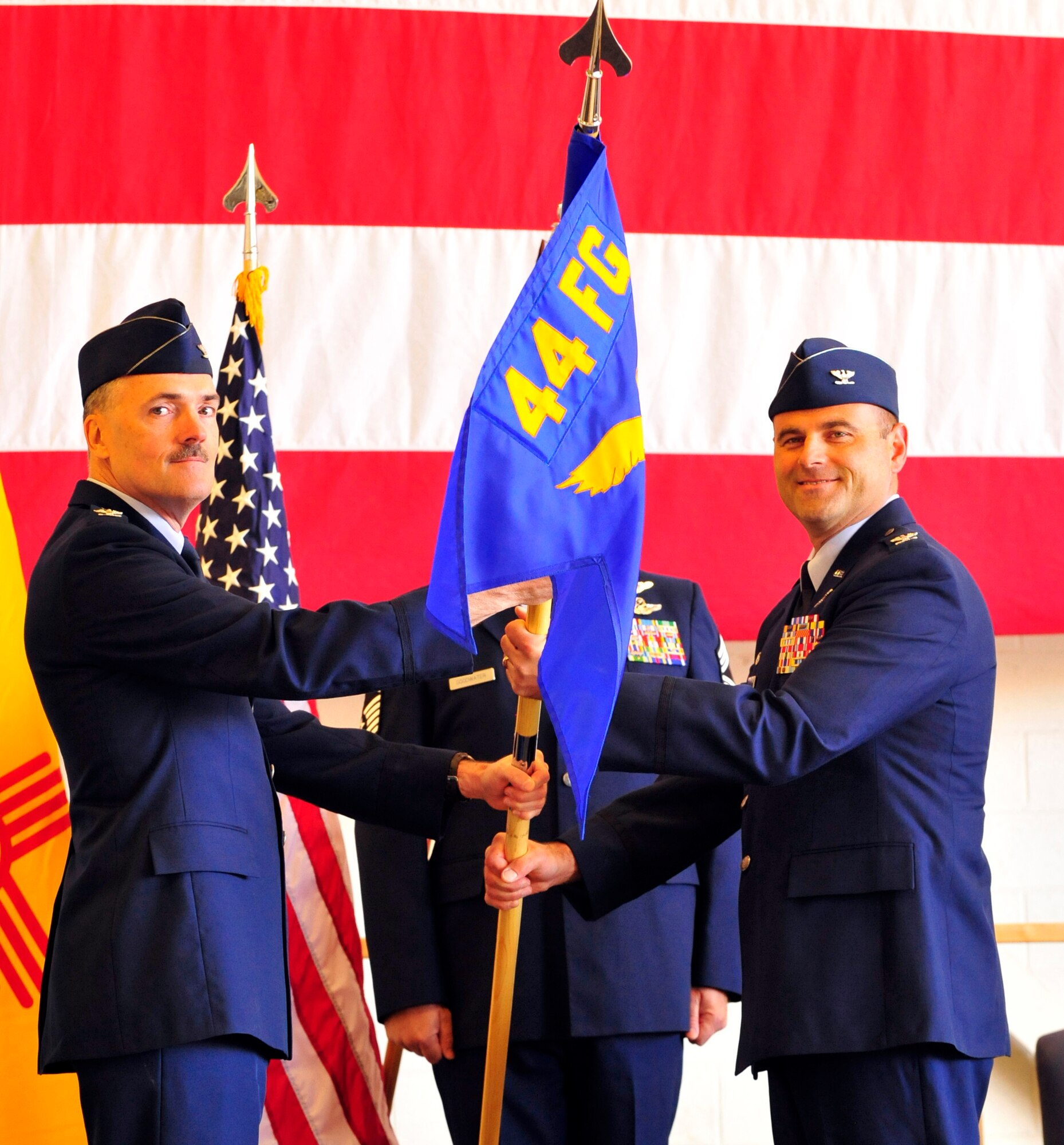 Colonel Kent Furman takes command of the 44th Fighter Group during a change of command ceremony April 15 at Holloman Air Force Base, NM. Col. William Lyons, 301st Fighter Wing vice commander presided. (U.S. Air Force photo/SrA Martha Whipple)