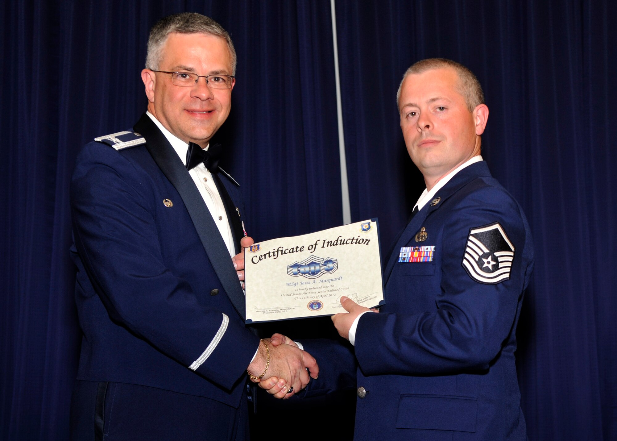 Twenty-one master sergeants were inducted into the Senior Noncommissioned Officer Corps April 14, 2012, during a ceremony at the Landings, Dover Air Force Base, Del. The 512th Top 3 Association hosted the 7th Annual SNCO Induction Ceremony. (U.S. Air Force photo/Tech. Sgt. Charles Walker)