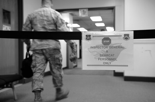 A Pacific Air Force Inspector General team member heads to the designated IG team area on Kunsan Air Base, Republic of Korea, April 19, 2012. Inspectors will be on Kunsan AB through the month of April as part of the Wolf Pack’s Consolidated Unit Inspection. (U.S. Air Force photo/Senior Airman Jessica Hines) 