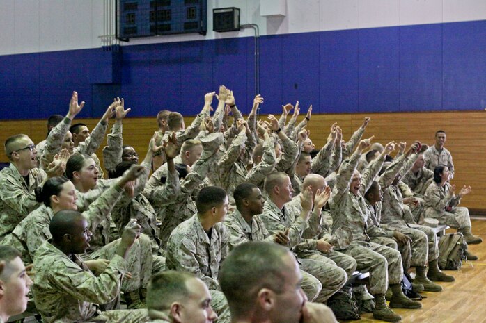 Marines with Combat Logistics Company 36 react enthusiastically to CLC-36 taking first place during the 2012 Commander’s Cup Challenge Sumo Basho at the IronWorks Gym sports courts aboard Marine Corps Air Station Iwakuni April 20, 2012. Combat Logistics Company 36 took first place with 30 points, Station Operations finished second with 27 points and Marine Air Control Squadron 4 Detachment B took third with 25 points. Along with those three units, groups from Marine Aviation Logistics Squadron 12, Marine Wing Support Squadron 171 and Robert M. Casey Medical and Dental Clinic were awarded 20 points.