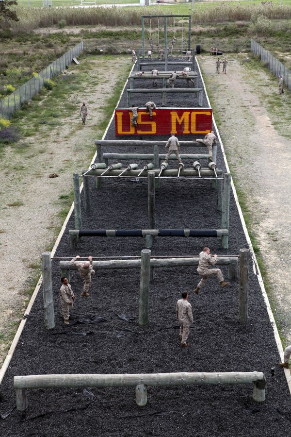 Marines with Charlie Company, Battalion Landing Team 1st Battalion, 2nd Marine Regiment, 24th Marine Expeditionary Unit, run an obstacle course here, April 19, 2012, during a day of training before enjoying time off in Spain. The 24th MEU, partnered with the Navy's Iwo Jima Amphibious Ready Group, is currently deployed as a theater reserve and crisis response force capable of a variety of missions from full-scale combat operations to humanitarian assistance and disaster relief.