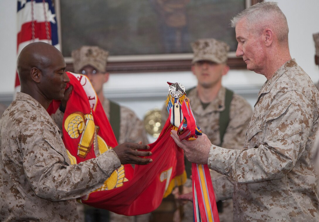 Maj. Gen. John A. Toolan (right), the commanding general of 2nd Marine Division and Sgt. Maj. Michael F. Jones (left), the sergeant major of 2nd MarDiv, took part in the deactivation ceremony for II Marine Expeditionary Force (Forward), April 18, aboard Marine Corps Base Camp Lejeune, N.C. The ceremony officially marked the end of II MEF (Fwd.)’s service after the unit’s year-long deployment to Afghanistan, during which time it served as the headquarters element of NATO’s Regional Command Southwest.