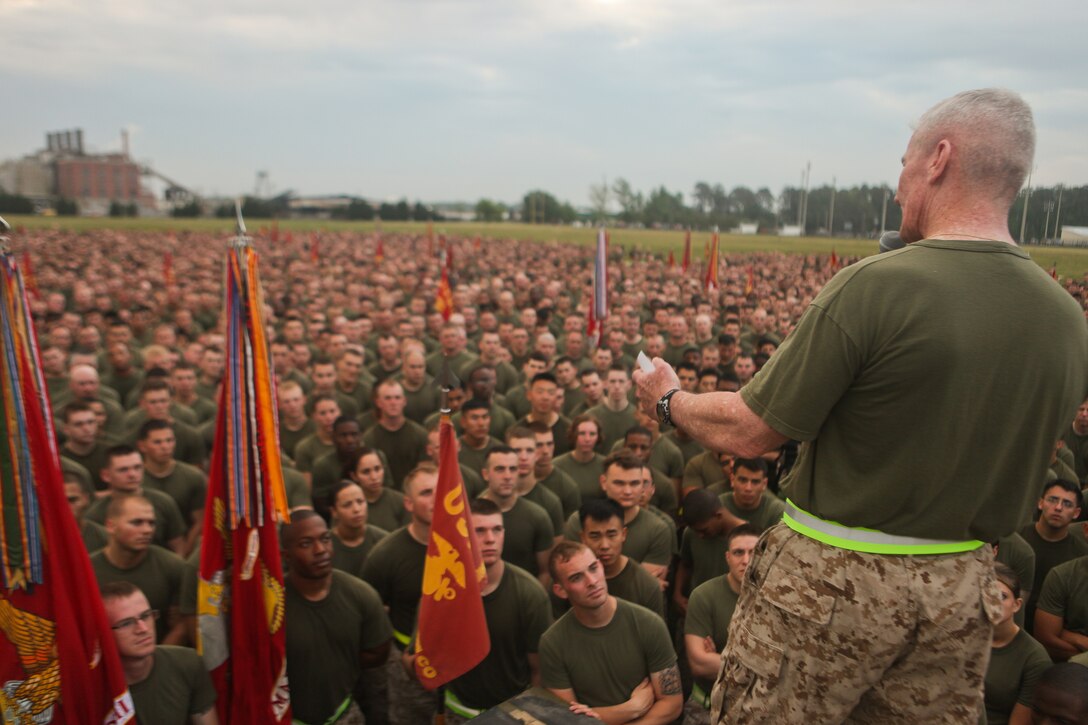 Maj. Gen. John A. Toolan, commanding general of 2nd Marine Division, speaks to his Marines after the 2nd Marine Division run aboard Marine Corps Base Camp Lejeune, April 20. In his address to the Marines, Toolan spoke about historical  Division achievements on this month in history and the importance of keeping one's honor clean. (Official U.S. Marine Corps photo by Cpl. Timothy L. Solano)