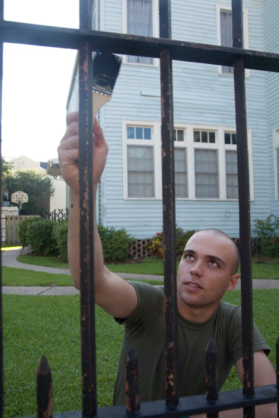 Pfc. Cameron D. Hathaway, a tank crewman with Company C, 1st Battalion, 6th Marine Regiment, paints the fence around the Raintree House during a community service project in New Orleans, April 20, 2012. The Marines repainted the fence as a community relations project as a way to give back to the community during their visit to New Orleans. The 26th Marine Expeditionary Unit is currently providing support to the commemoration of the Battle of New Orleans. Starting through April and continuing through 2015, the Navy, Marine Corps, and Coast Guard will commemorate the Bicentennial of the War of 1812 and the Star Spangled Banner. The War of 1812 celebration with commemorate the rich Naval history and showcase the capabilities of today's Navy-Marine Corps team. (Official Marine Corps photo by Lance Cpl. Scott L. Tomazycki)