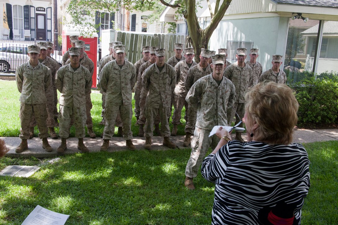 U.S. Marines with 26th Marine Expeditionary Unit helped are recognized for restoring a wrought-iron fence at the Raintree House, a shelter for abused and neglected teenage girls in New Orleans, April 20, 2012.   The Marines repainted the fence as a community relations project as a way to give back to the community during their visit to New Orleans. The 26th MEU is currently providing support to the commemoration of the Battle of New Orleans. Starting through April and continuing through 2015, the Navy, Marine Corps, and Coast Guard will commemorate the Bicentennial of the War of 1812 and the Star Spangled Banner. The War of 1812 celebration with commemorate the rich Naval history and showcase the capabilities of today's Navy-Marine Corps team. (Official Marine Corps photo by Lance Cpl. Scott L. Tomazycki)