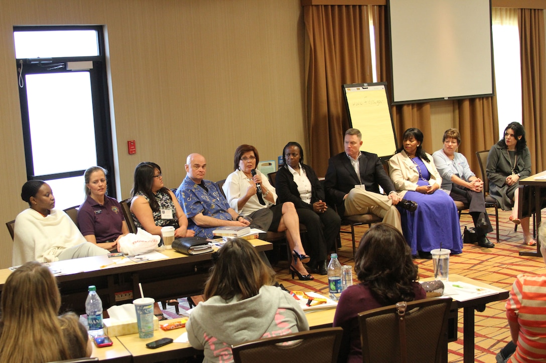 A panel of presenters answer questions from spouses during the 8th Marine Corps District's District Spouse Orientation Course, April 20 in Arliington, Texas. The course was created by the district to help familiarize spouses with the recruiting world, while offering knowledge and resources to promote a successful recruiting tour.