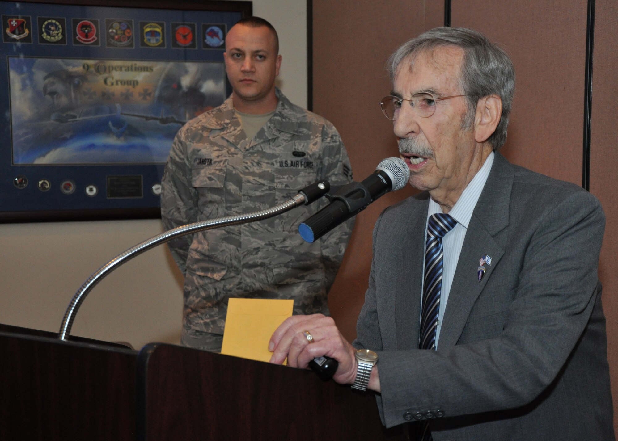 Bernard Marks speaks during a Holocaust Remembrance Luncheon at Beale Air Force Base, Calif., April 17, 2012. Marks is a survivor of the Holocaust and the Aushwitz extermination camp. (U.S. Air Force photo by Staff Sgt. Robert M. Trujillo/Released)   