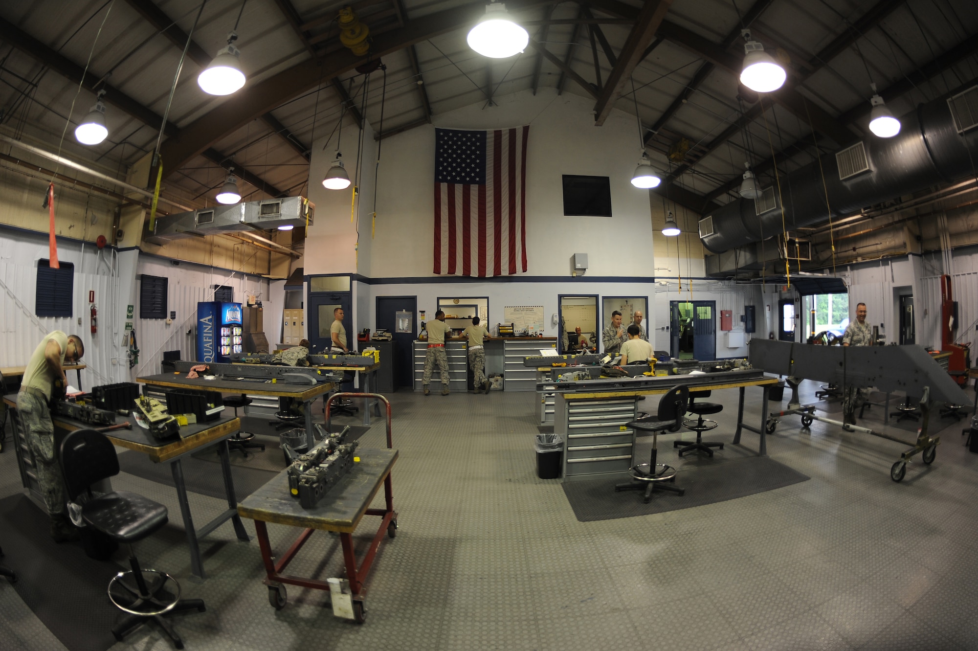 Airmen perform maintenance in the armament shop on Seymour Johnson Air Force Base, N.C., April 19, 2012. The shop of 53 Airmen is responsible for 4,400 pieces of equipment valued at over $500 million. (U.S. Air Force photo/Airman 1st Class John Nieves Camacho/Released)