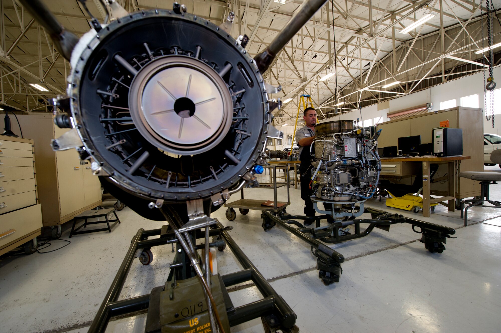HOLLOMAN AIR FORCE BASE, N.M. – John Segovia, an aircraft engine mechanic for the T-38 Talon, finishes tearing down a J85 jet engine April 19. Mechanics tear down and re-build jet engines regularly as a part of a maintenance routine to ensure the working order of every element within the engine. (U.S. Air Force photo by Daniel E. Liddicoet/Released)