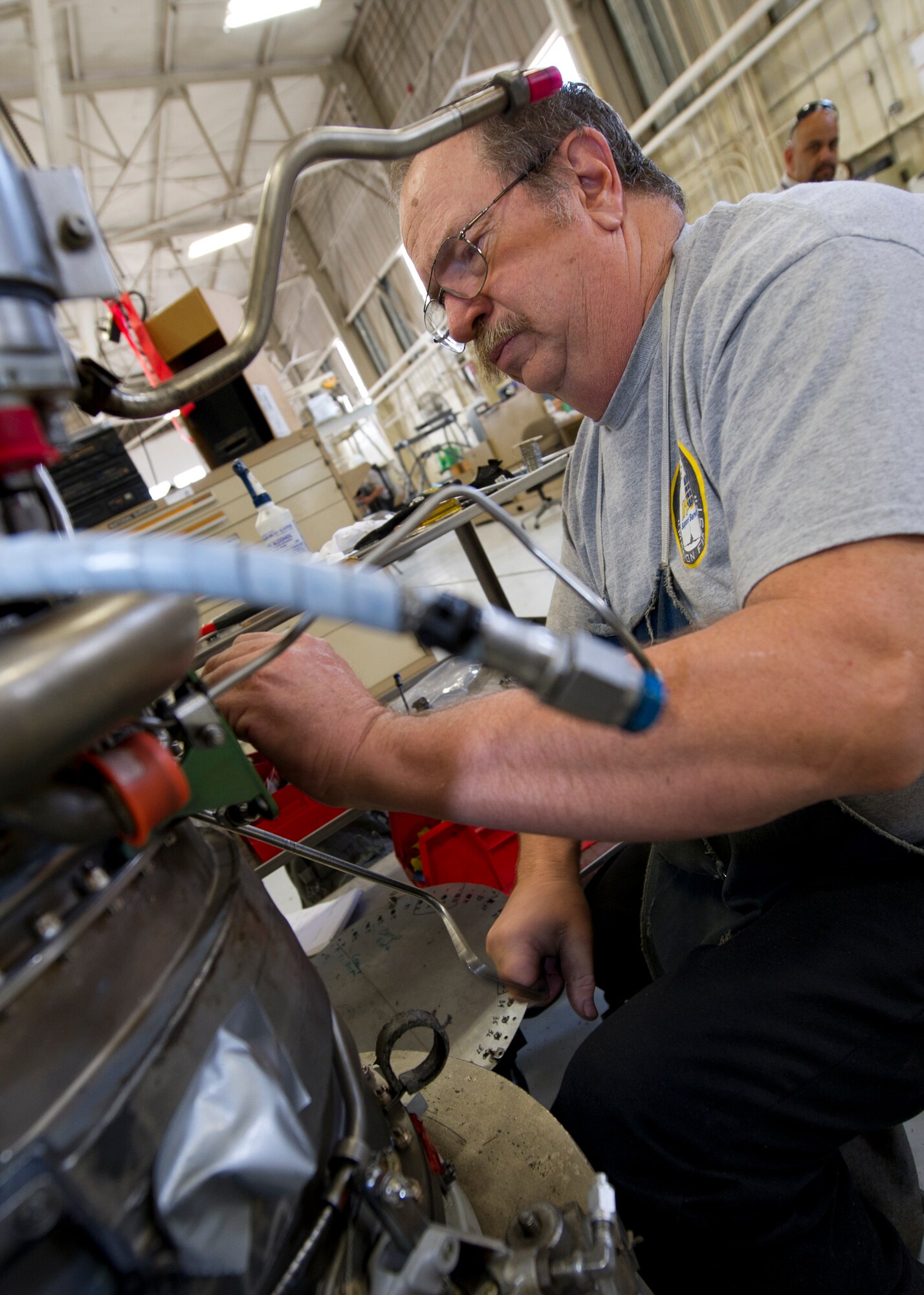HOLLOMAN AIR FORCE BASE, N.M. – Bill Hyde, an aircraft engine mechanic for the T-38 Talon, re-builds a J85 jet engine April 19. All of the mechanics working on the T-38 are civilians with years of experience working on aircraft, and are retired veterans of the military. (U.S. Air Force photo by Daniel E. Liddicoet/Released)