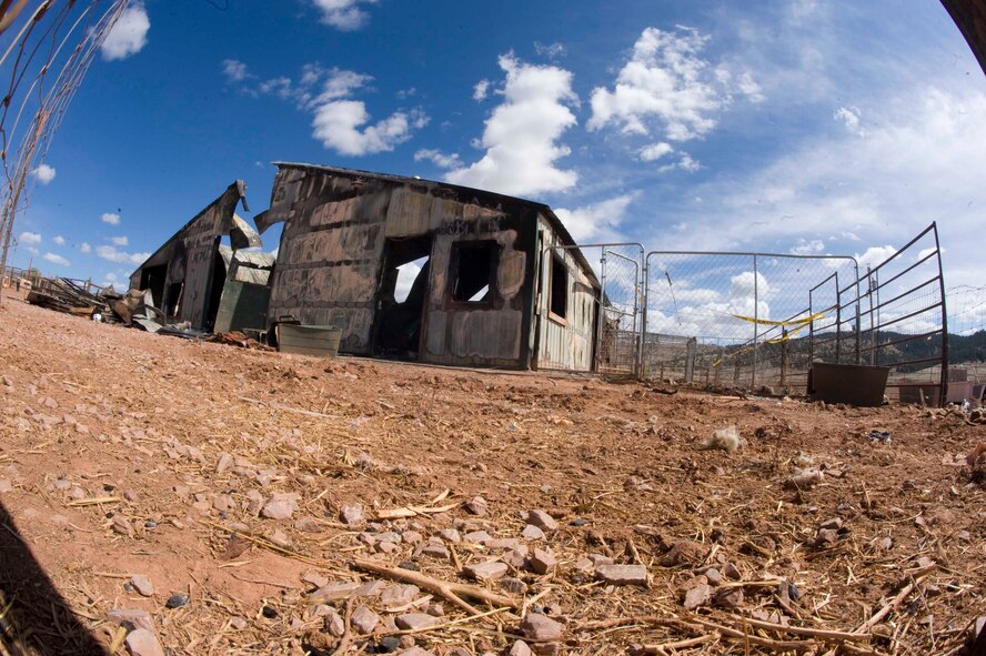 The burned out remains of the Battle Mountain Humane Society animal shelter in Hot Springs S.D., April 13, 2012.  A fluorescent light bulb was found to be the cause of the fire which completely destroyed the shelter.  (U.S. Air Force photo by Airman 1st Class Anania Tekurio/Released)    
