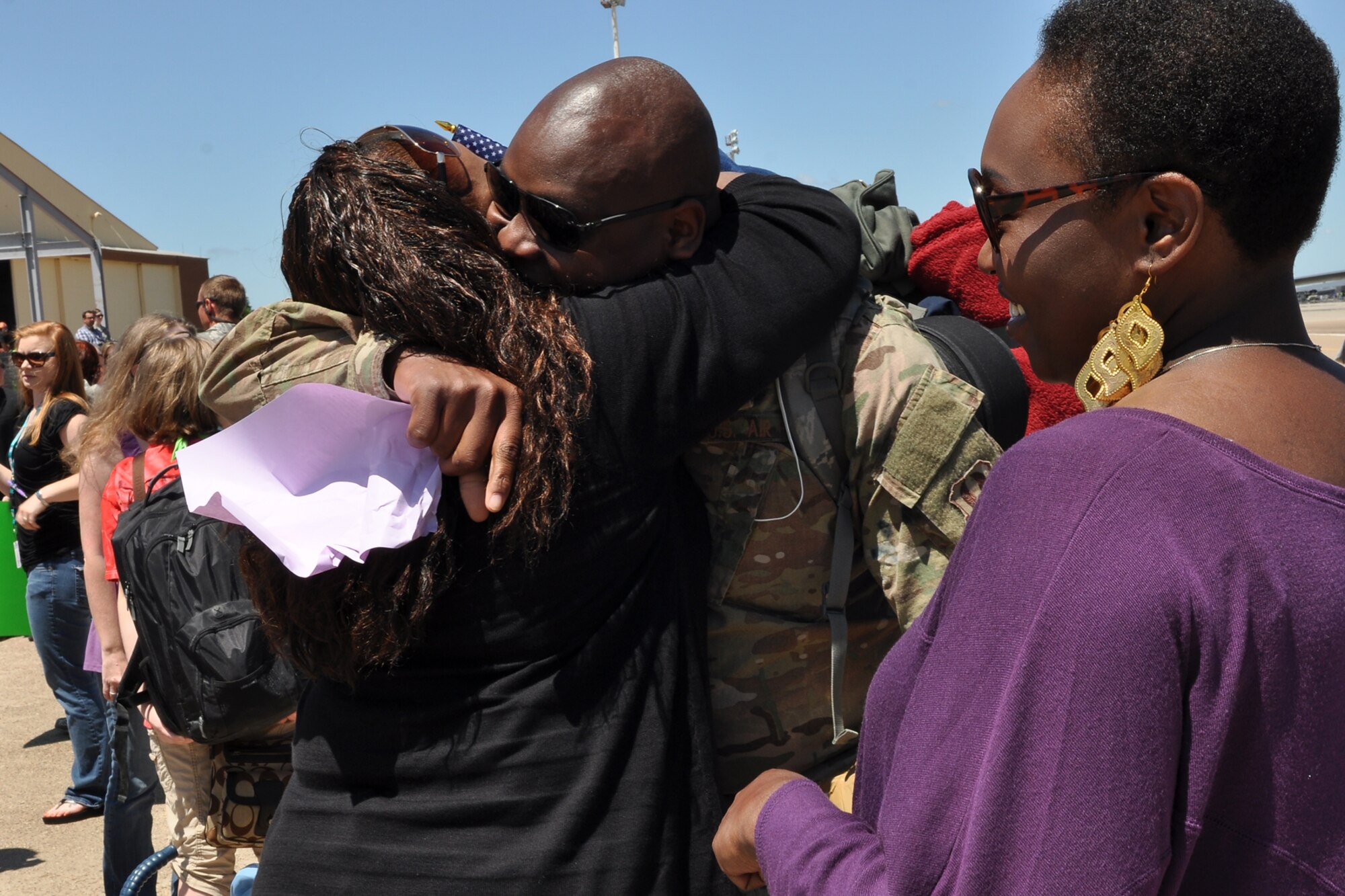 Staff Sgt. Gregory Dunn, who is assigned to the 917th Aircraft Maintenance Squadron, receives a warm welcome home hug at Barksdale Air Force Base, La., April 17, 2012. Dunn was one of the final 47 Airmen from the 917 Fighter Group to return home from a deployment to Afghanistan. (U.S. Air Force photo by Betty Stephens)  