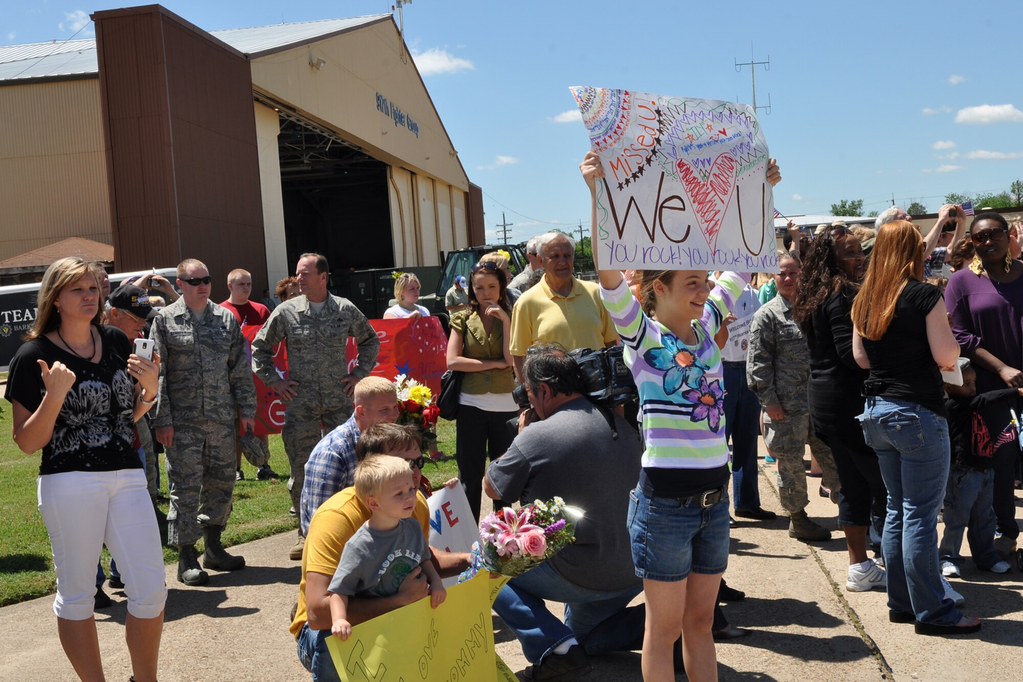Family, friends and co-workers welcome home the final group of 917th Fighter Group at Barksdale Air Force Base, La., April 17, 2012. A C-17 Globemaster III from the 436th Airlift Wing, Dover Air Force Base, Del., carried the final 47 Airmen from the 917 FG who were deployed to Afghanistan. (U.S. Air Force photo by Betty Stephens)   