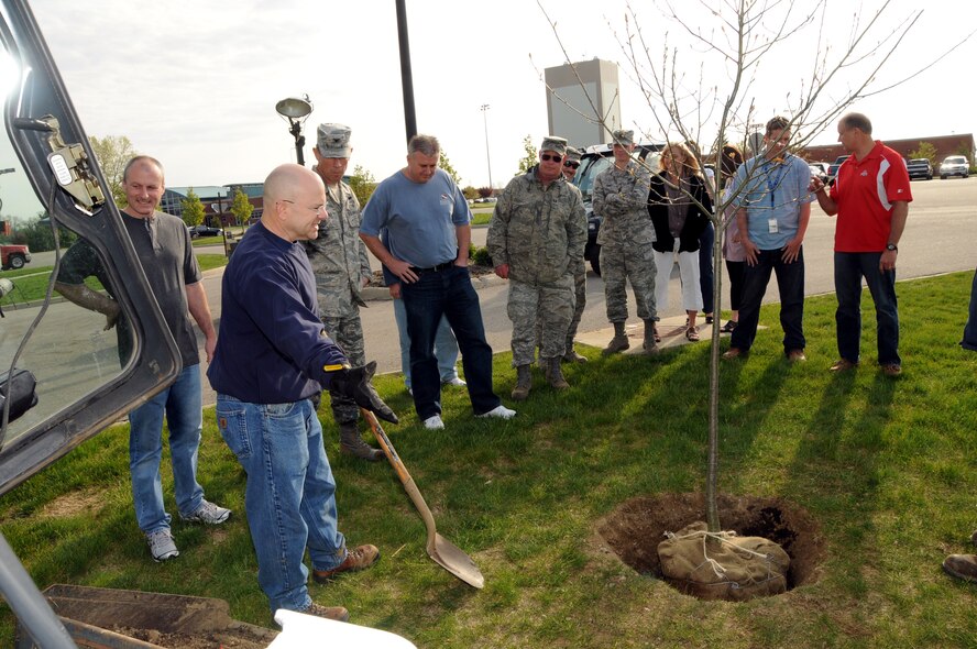 Mr. Tom Haley, 178th Fighter Wing environmental manager recommends ways to be environmentally friendly at a tree planting event to observe Earth Day at the Springfield Ohio Air National Guard Base April 20.