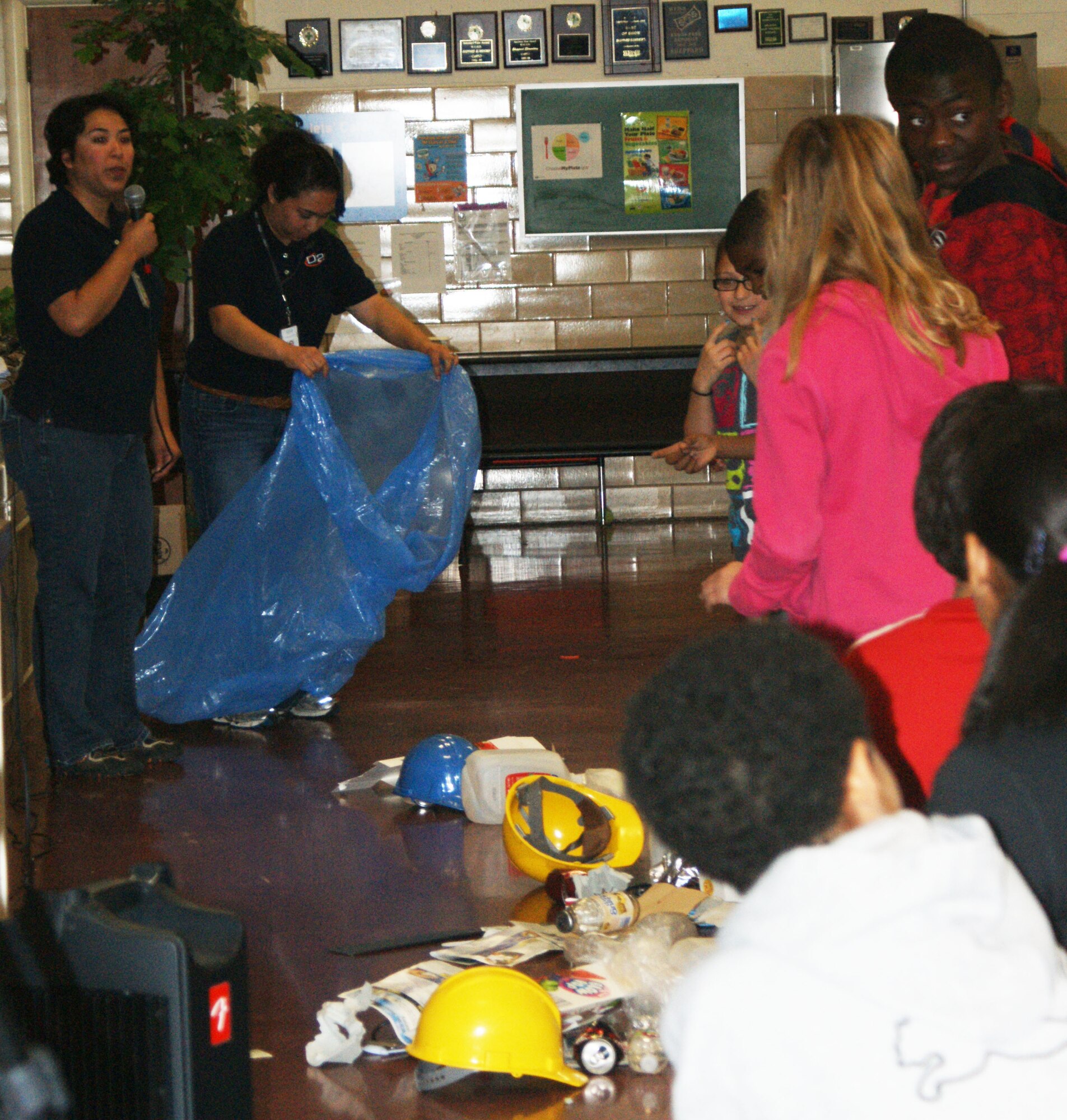Students at Sheppard Elementary School participate in a recycling relay on April 20, 2012. The relay was part of an Earth Day celebration at the school, hosted by the 82d Civil Engineering Squadron and Defense Support Services. (U.S. Air Force photo/Kimberly Dagdag)