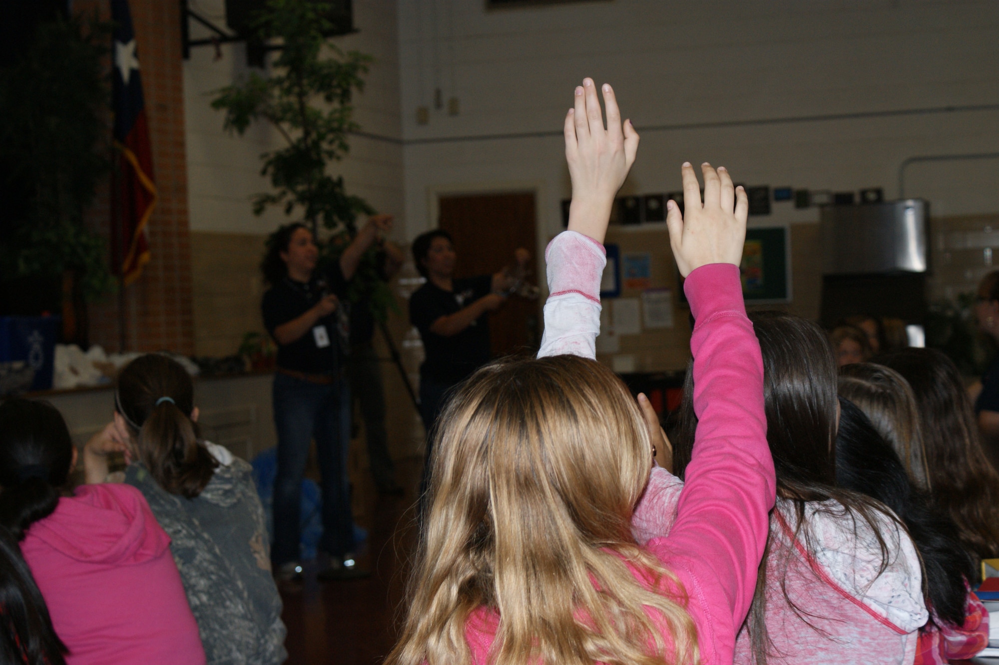 Students at Sheppard Elementary School ask questions of the Defense Support Services presenters during an Earth Day event on April 20, 2012. During the event students learned the importance of recycling and what the potential effects of not recycling can be. (U.S. Air Force photo/Kimberly Dagdag)