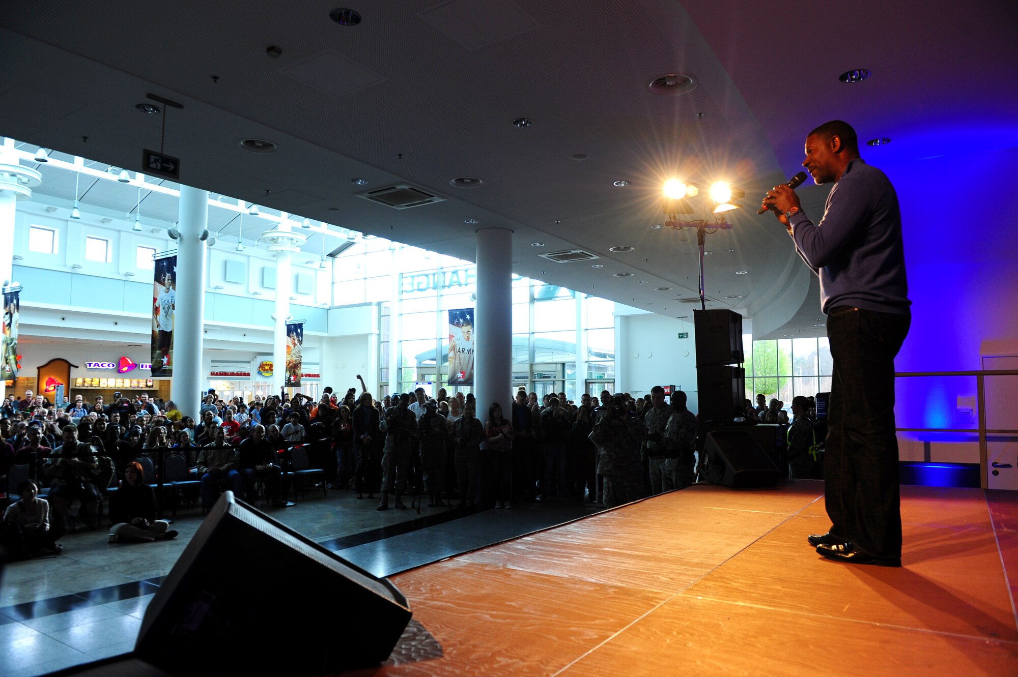 Actor Dennis Haysbert performs during the United Service Organizations and Armed Forces Entertainment tour on Ramstein Air Base, Germany, April 19, 2012. The ninth Vice Chairman of the Joint Chiefs of Staff joined with a cast of entertainers to visit troops stationed overseas. The tour consisted of live performances, and the group visited different organizations throughout the Kaiserslautern Military Community. (U.S. Air Force photo/Airman Basic Brea Miller)