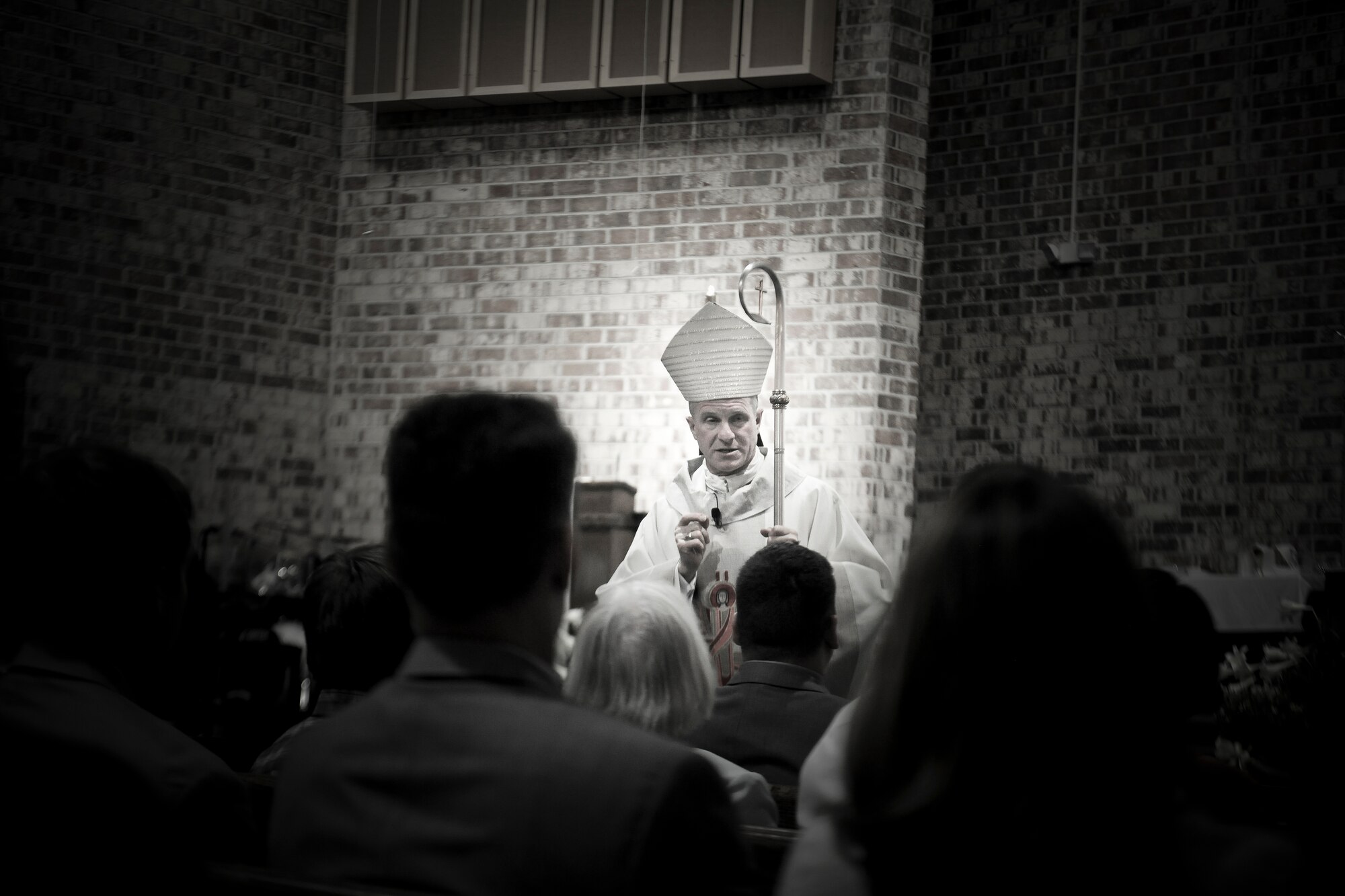 Archbishop Timothy Broglio, Archdiocese for Military Services, USA, speaks to the members of the Confirmation Mass at Moody Air Force Base, Ga., April 16, 2012.  Confirmation Mass was just one part of the archbishop’s visit; he also met with the parish and its community.(U.S. Air Force Photo by Airman 1st Class Paul Francis/Released)

