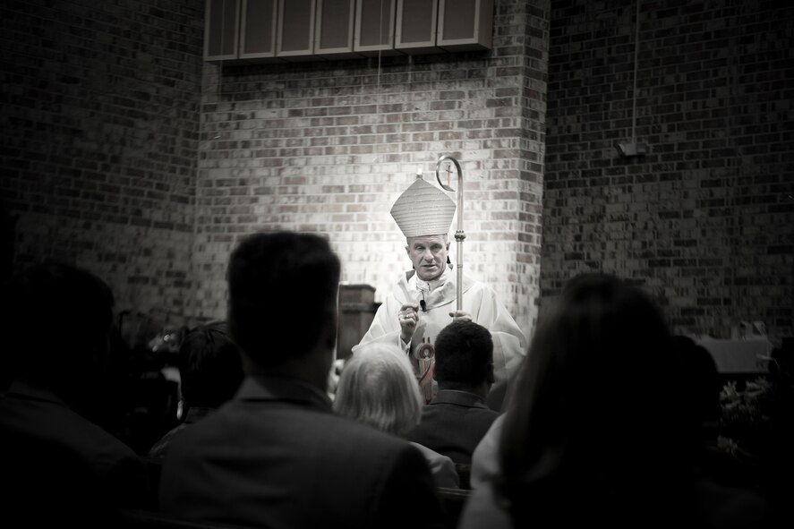 Archbishop Timothy Broglio, Archdiocese for Military Services, USA, speaks to the members of the Confirmation Mass at Moody Air Force Base, Ga., April 16, 2012.  Confirmation Mass was just one part of the archbishop’s visit; he also met with the parish and its community.(U.S. Air Force Photo by Airman 1st Class Paul Francis/Released)

