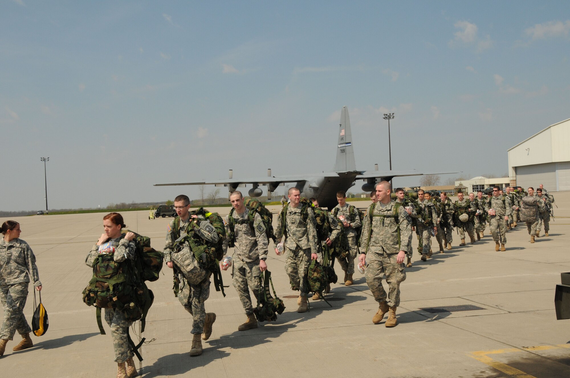 Canisius College Army ROTC Battalion Cadets march to the 107th Airlift Wing's C-130 aircraft for real world Army deployment training April 19, 2012 (U.S.Air Force Photo/Senior Master Sgt. Ray Lloyd)