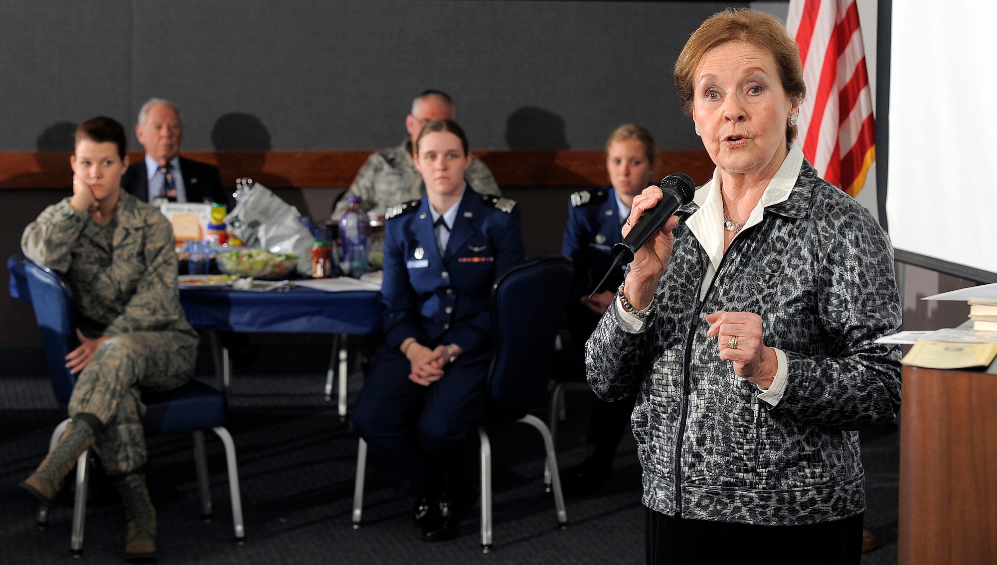 Marion Blumenthal Lazan speaks to cadets in Mitchell Hall April 17, 2012, about her experiences during World War II in the Bergen-Belsen concentration camp, located in northwestern Germany. She told the audience, "I do recognize the importance of sharing that period of history because in a few short years, Holocaust survivors will no longer be able to give a firsthand account of it." (U.S. Air Force photo/Raymond McCoy)