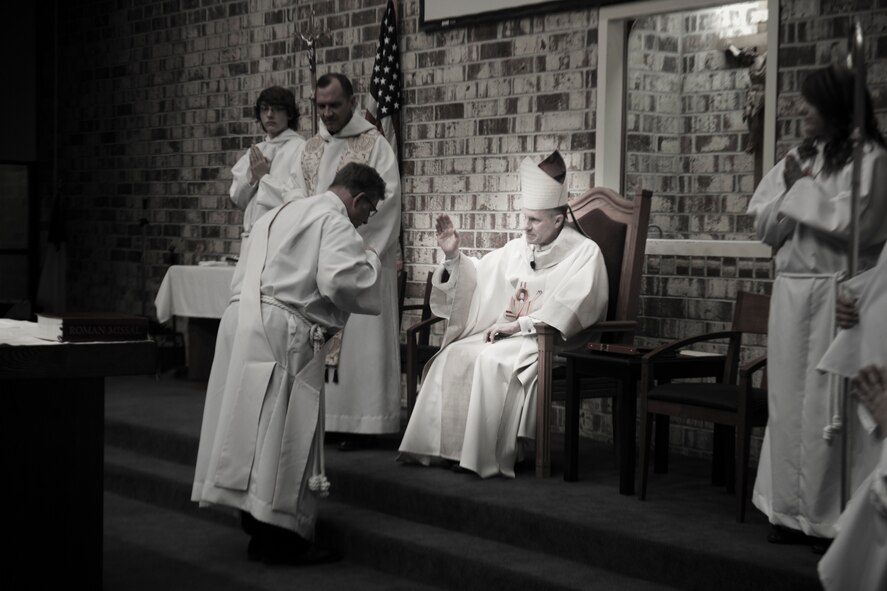 Archbishop Timothy Broglio, Archdiocese for Military Services, USA, performs a confirmation mass at Moody Air Force Base, Ga., April 16, 2012. The Sacrament of Confirmation is a major milestone in the religious journey of the Catholic church. (U.S. Air Force Photo by Airman 1st Class Paul Francis/Released)
