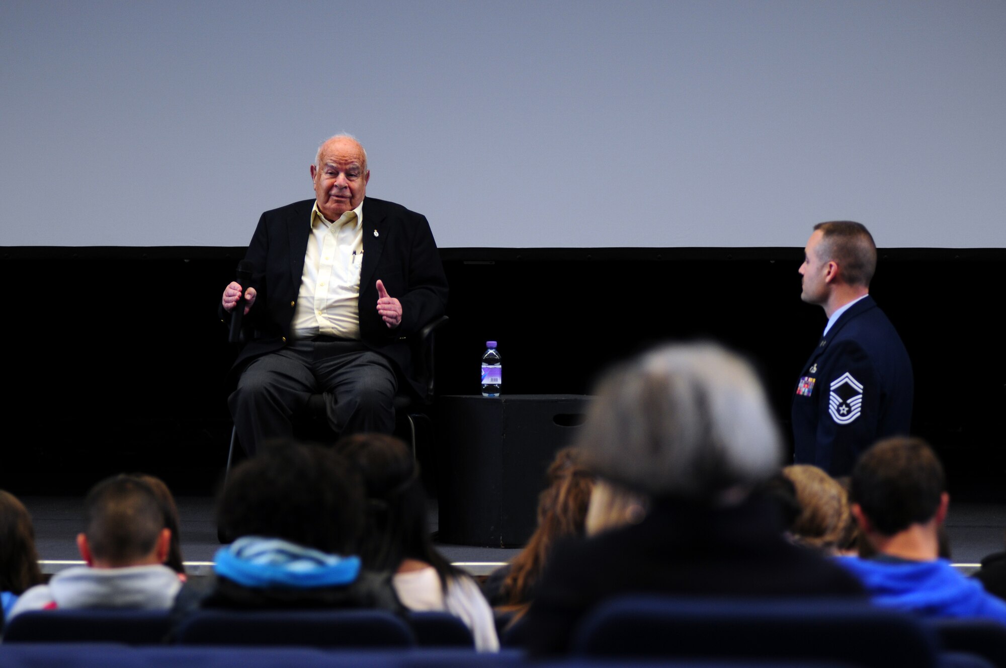 ROYAL AIR FORCE LAKENHEATH, England – Geoffrey Perry speaks with Lakenheath High School students about his experiences in World War II during a Holocaust Remembrance seminar April 19, 2012. Perry was born in Germany before becoming a refugee and eventually enlisting as a British soldier. (U.S. Air Force photo by Airman 1st Class Cory D. Payne)