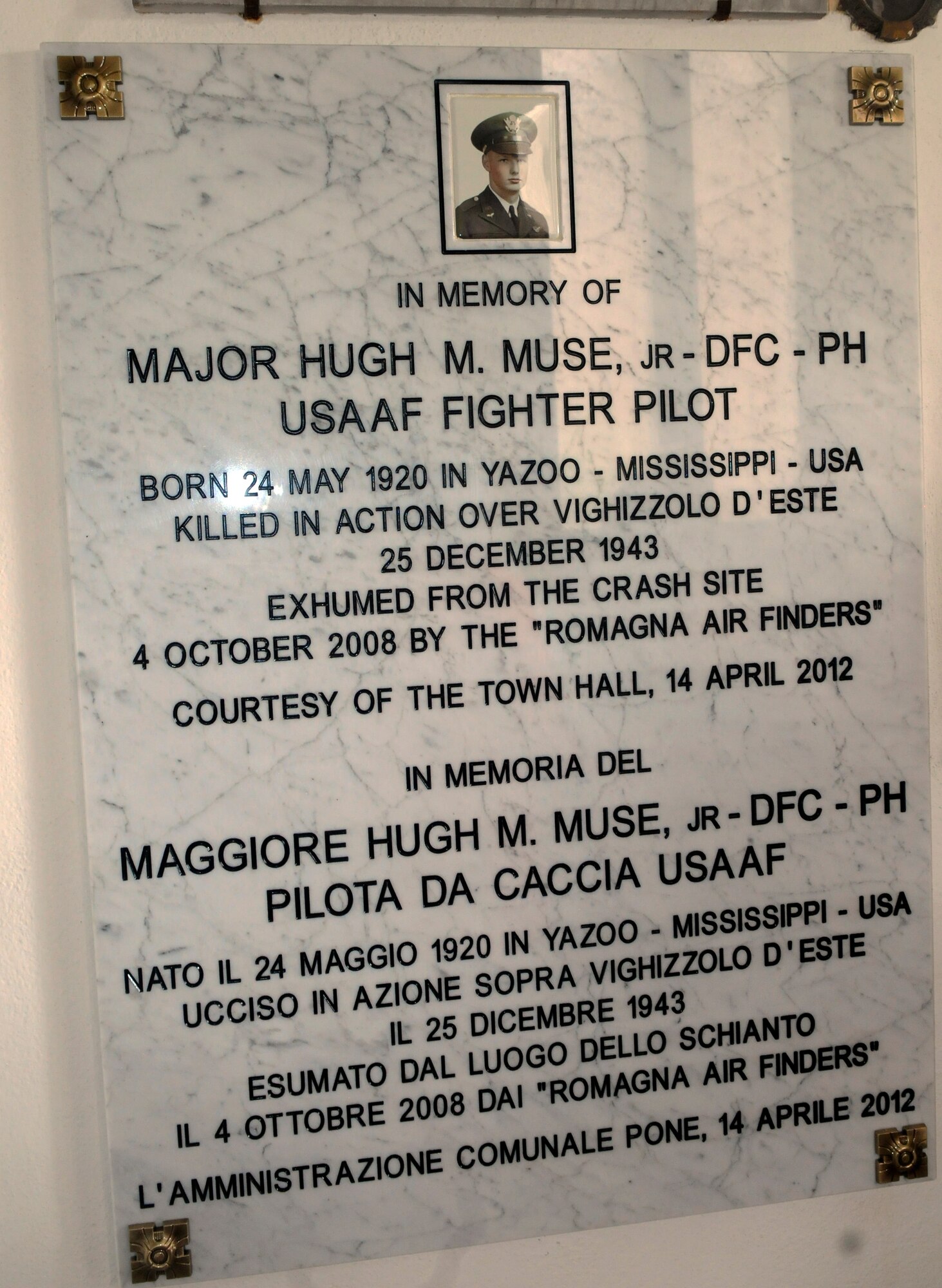 A plaque dedicated to Maj. Hugh Muse, Jr. is displayed during a remembrance ceremony April 14 in Vighizzolo D’Este, Italy.  Hugh was killed in action when his aircraft was shot down during a bombing mission on Dec. 25, 1943. (U.S Air Force photo/Airman 1st Class Briana Jones) 
