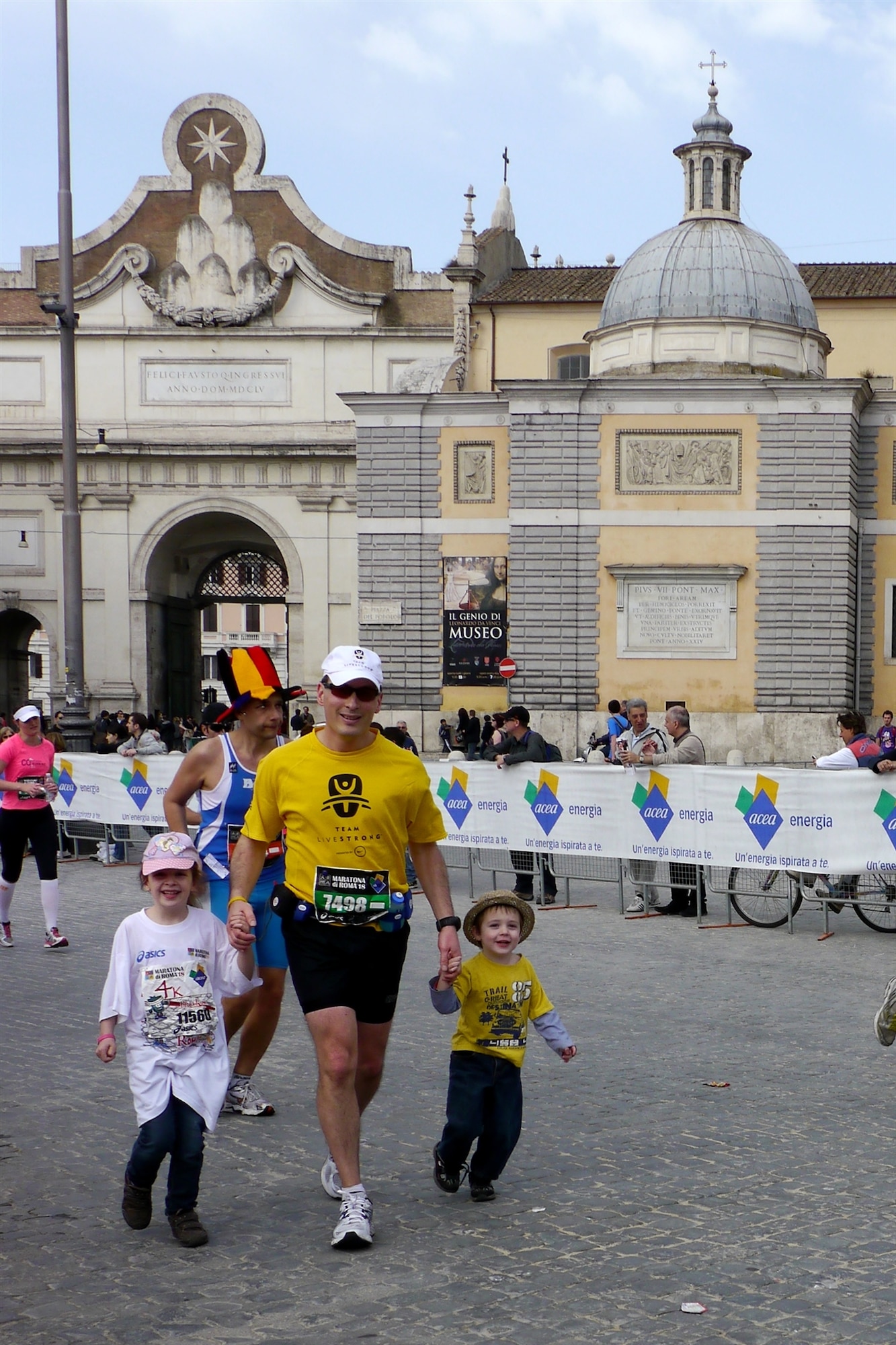Lt. Col. Bryan Patchen, 603rd Air and Space Operations Center mission integration deputy commander runs with his children during a marathon in Rome on March 18, 2012. The marathon is one of four events in four different countries meant to commemorate four years since being diagnosed with cancer. (Courtesy Photo)
