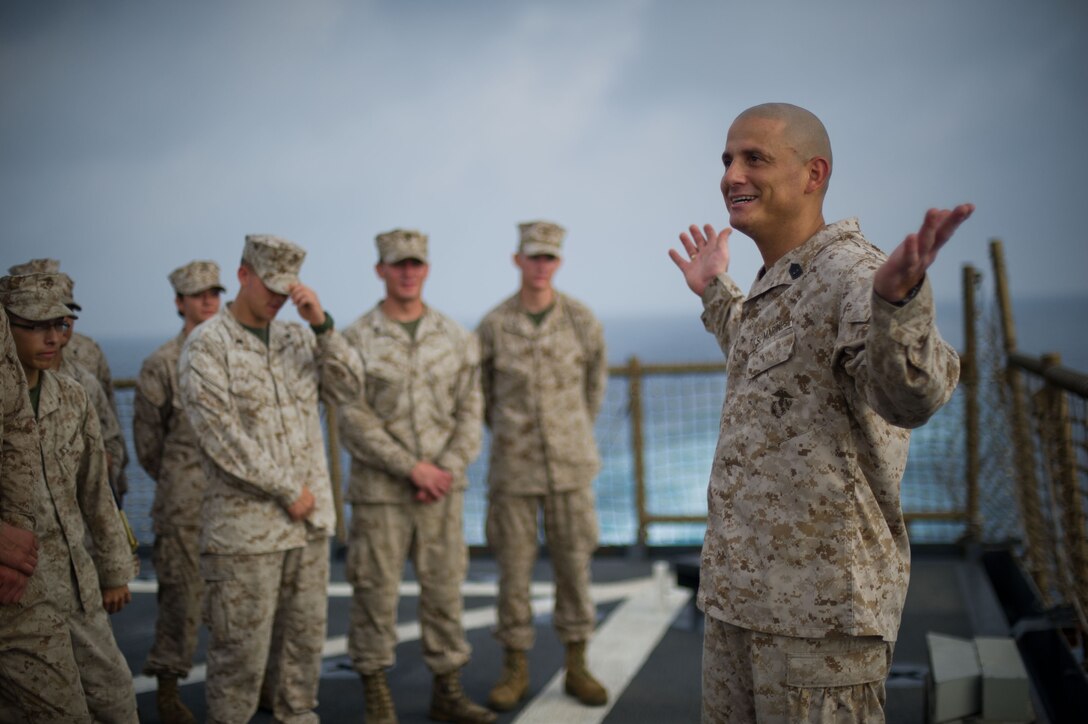 First Sgt. Josue Ayala speaks to Marines with the 11th Marine Expeditionary Unit aboard USS Pearl Harbor here April 20 during formal noncommissioned officer training. Ayala hails from Ponce, Puerto Rico and serves as 1st Sgt for Company K, Battalion Landing Team 3/1. The team serves as the ground combat element for the unit is deployed as part of the Makin Island Amphibious Ready Group, currently a U.S. Central Command theater reserve force. The group is providing support for maritime security operations and theater security cooperation efforts in the U.S. Navy's 5th Fleet area of responsibility.