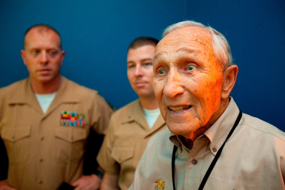 Bert Stolier, a Marine Raider who volunteers at the National World War II Museum in New Orleans, talks to a group of 26th Marine Expeditionary Unit Marines about his experiences in the Pacific, April 21, 2012. The 26th MEU is providing support to the commemoration of the Battle of New Orleans. Starting April and continuing through 2015, the Navy, Marine Corps, and Coast Guard will commemorate the Bicentennial of the War of 1812 and the Star Spangled Banner. The War of 1812 celebration will commemorate the rich Naval history and showcase the capabilities of today's Navy-Marine Corps team. (Official Marine Corps photo by Lance Cpl. Scott L. Tomaszycki)