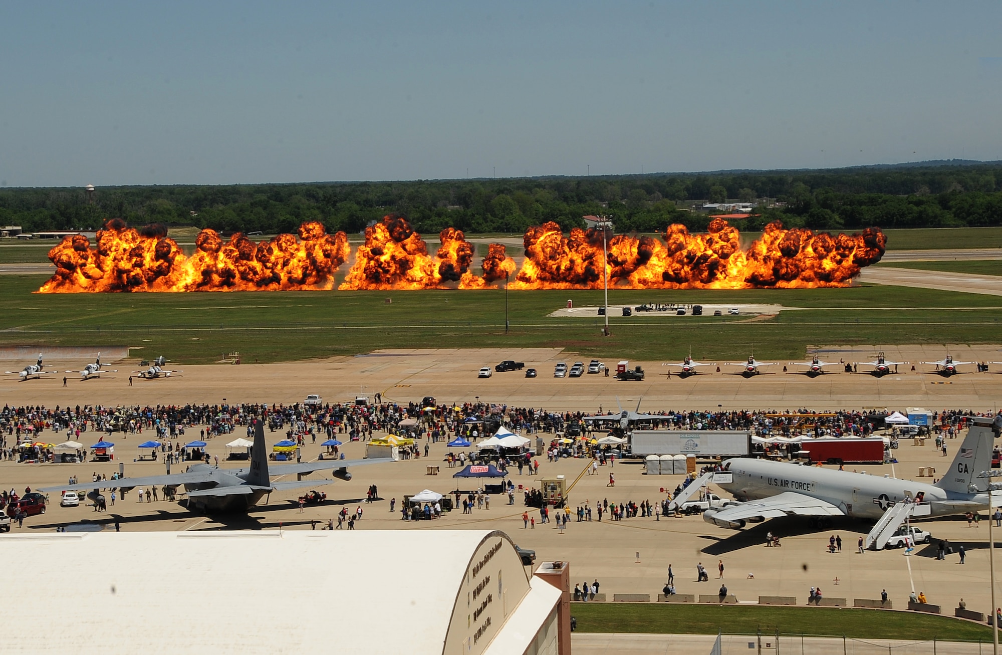 A wall of fire erupts after a B-52H Stratofortress passes during the Defenders of Liberty 2012 Air Show on Barksdale Air Force Base, La., April 21. More than 20 aerial acts were presented to the crowd throughout the air show, headlined by the Air Force Thunderbirds. (U.S. Air Force photo/Staff Sgt. Amber Ashcraft) (RELEASED)