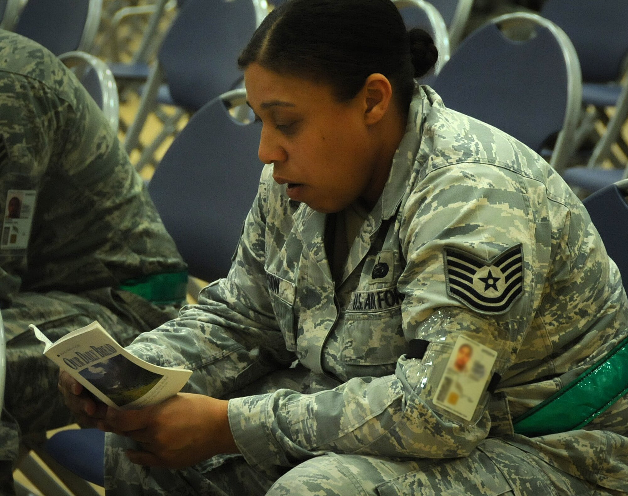 Tech. Sgt. Joy Hopson, reads while waiting for briefings as part of the Readiness Assistance Visit.  The 2012 RAV, conducted April 21-28,  helps the unit prepare for the 2013 Operational Readiness Inspection by conducting deployment and operational scenarios.  The scenarios and related training begin at the Minneapolis Air Reserve Station with most of the training conducted at the Air National Guard Combat Readiness Training Center, Gulfport, Miss.(U.S. Air Force photo by Tech Sgt. Bob Sommer)