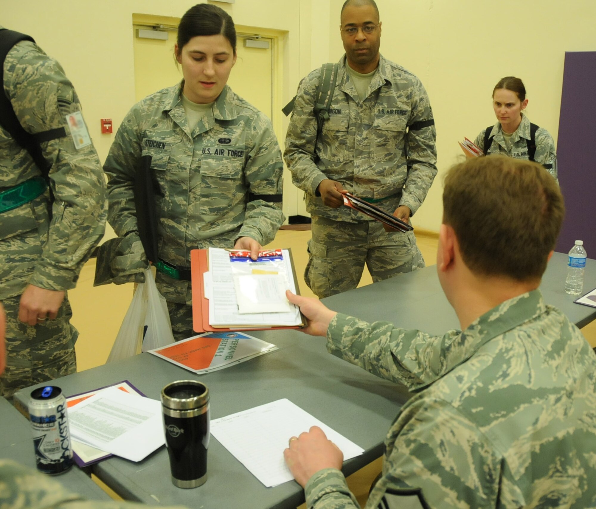 SrA Nadja Steichen, processes administratively as part of the Readiness Assistance Visit.  The 2012 RAV, conducted April 21-28,  helps the unit prepare for the 2013 Operational Readiness Inspection by conducting deployment and operational scenarios.  The scenarios and related training begin at the Minneapolis Air Reserve Station with most of the training conducted at the Air National Guard Combat Readiness Training Center, Gulfport, Miss.(U.S. Air Force photo by Tech Sgt. Bob Sommer)