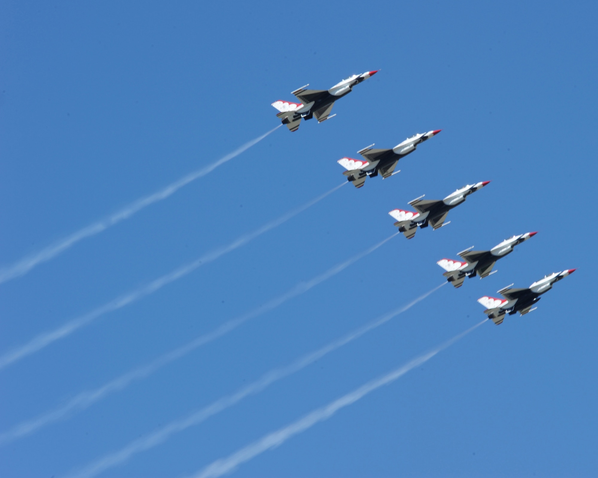 The United States Air Force Thunderbirds demonstrate one of their aerial formations during the Barksdale Air Force Base 2012 Defenders of Liberty Air Show April 21. The Air Force Air Demonstration Squadron Thunderbirds, based at Nellis Air Force Base, Nev., is the Air Force's premier aerial demonstration team, performing at Air Shows and special events worldwide. (U.S. Air Force photo/Senior Airman Sean Martin) (Released)