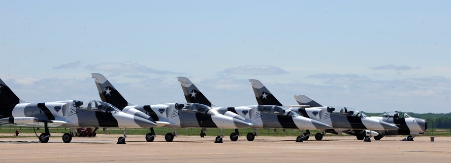 Aero L-39 Albatros aircraft and a Mikoyan-Gurevich MiG-17 wait to taxi before performing aerial stunts with the Black Diamond Jet Team at the 2012 Barksdale Air Force Base Defenders of Liberty Air Show April 21. The Black Diamond Jet Team was one of several aerial acts that performed during the air show, headlined by the U.S. Air Force Thunderbirds.  (U.S. Air Force photo/Airman 1st Class Joseph A. Pagán Jr.)(RELEASED)