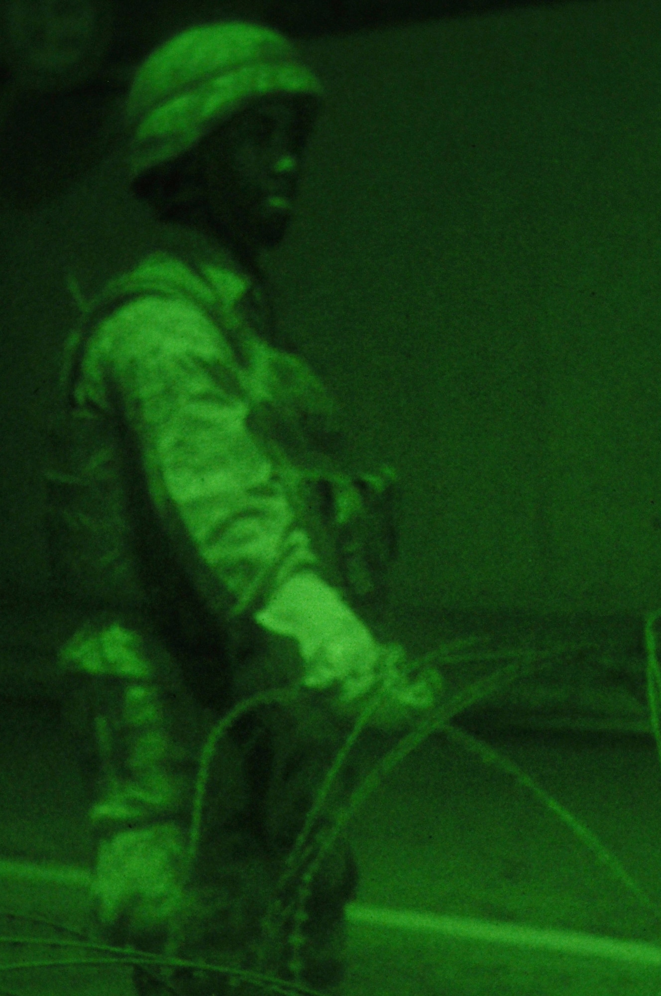 Airman 1st Class Kenneth Grier, 51st Security Forces Squadron, establishes a perimeter with concertina wire during operational readiness exercise Beverly Midnight 12-02 at Osan Air Base, Republic of Korea, April 22, 2012. (U.S. Air Force photo/Airman 1st Class Michael Battles)