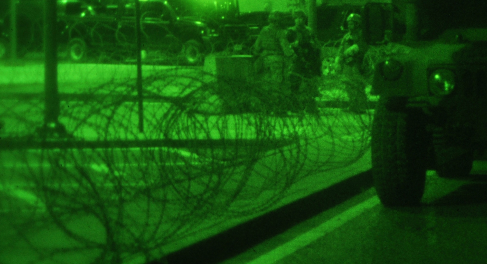 Members of the 51st Security Forces Squadron guard an entry control point during operational readiness exercise Beverly Midnight 12-02 at Osan Air Base, Republic of Korea, April 22, 2012. (U.S. Air Force photo/Airman 1st Class Michael Battles)