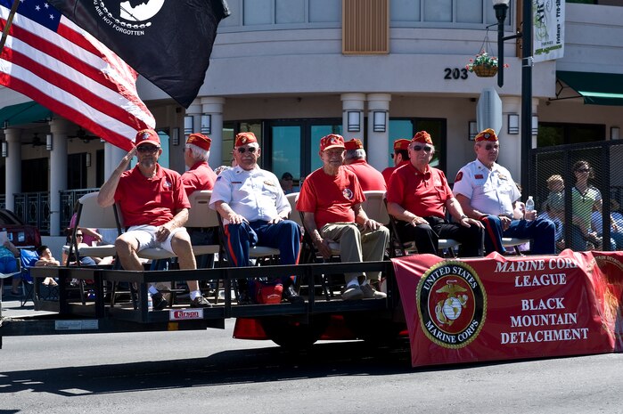 U.S. Marine Corps veterans participate in the parade during the Henderson Heritage Parade & Festival April 21, 2012, in Henderson, Nev. As one of the oldest traditions in Henderson, the parade featured a grand procession of unique entries, from floats to youth groups and hometown businesses to automobiles. (U.S. Air Force photo by Airman 1st Class Christopher Tam)