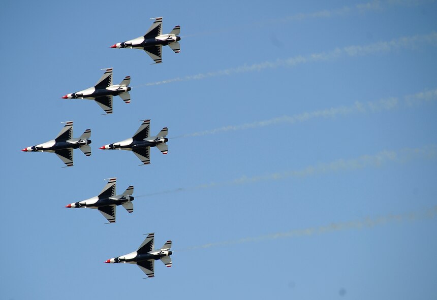 The Thunderbirds F-16 Fighting Falcons pass over the crowd during the 2012 Barksdale Air Force Base Defenders of Liberty Air Show April 21. The Air Force Air Demonstration Squadron Thunderbirds, based at Nellis Air Force Base, Nev., is the Air Force's premier aerial demonstration team, performing at air shows and special events worldwide. (U.S. Air Force photo/Staff Sgt. Amber Ashcraft) (RELEASED)