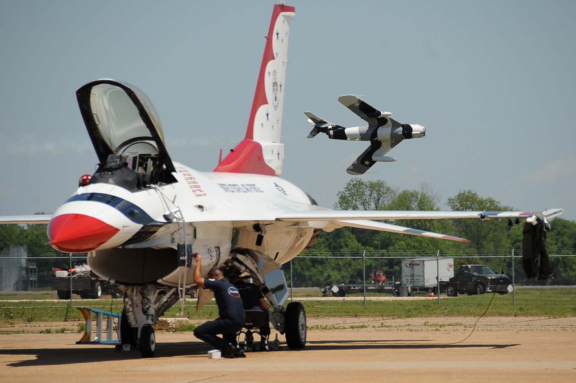 A Black Diamond Jet Team pilot flies low above the base flightline during the 2012 Barksdale Air Force Base Defenders of Liberty Air Show April 22. The annual air show featured several aerial demonstration acts, headlined by the U.S. Air Force Air Demonstration Squadron Thunderbirds. (U.S. Air Force photo/Staff Sgt. Amber Ashcraft) (RELEASED)
