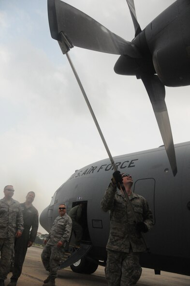 KURMITOLA AIR BASE, Bangladesh —Tech. Sgt. Greg Howard, C-130H crew chief, Kentucky National Guard from Cordyon, IN, adjusts the propellers of a C-130H aircraft as part of basic post-flight procedures at Kurmitola Air Base, Bangladesh, April 21, 2012. Sergeant Howard is one of more than 65 Airmen participating in this year’s Cope South exercise in Bangladesh. (U.S. Air Force photo by 1st Lt. Cammie Quinn)
