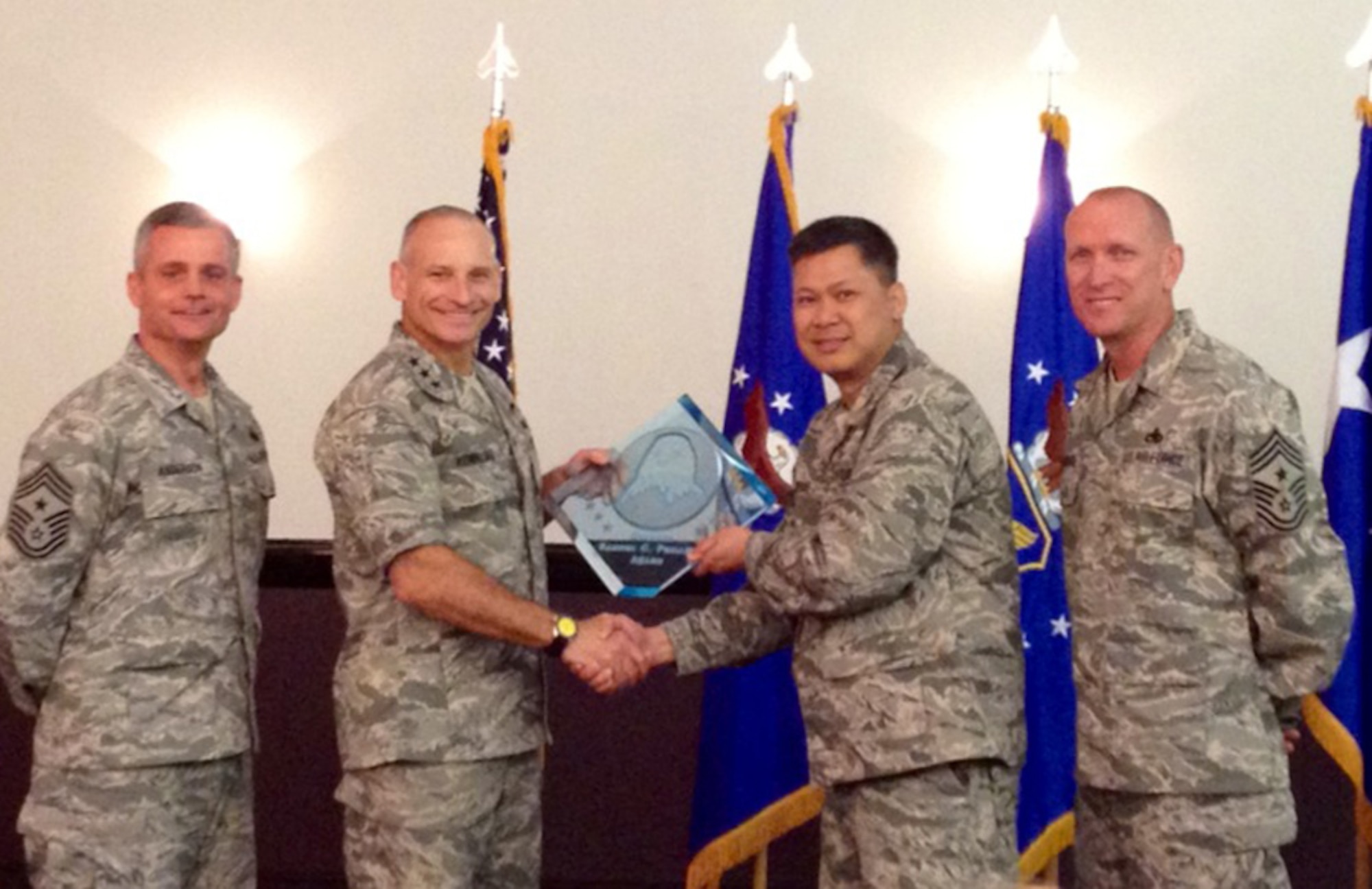 Air Force Global Strike Command Commander Lt. Gen. Jim Kowalski and AFGSC Command Chief Chief Master Sgt. Brian Hornback, presented three trophies to Col. H.B. Brual, 341st Missile Wing Commander and Chief Master Sgt. Chuck Anderson, 341st MW Command Chief, during the AFGSC Commander's Conference at Barksdale Air Force Base, La., earlier this month. The trophies include, from top to bottom, the Col. Lee R. Williams Memorial Award, the Gen. Samuel C. Phillip Award and the Col. Lowell F. McAdoo Award. (U.S. Air Force/courtesy photo)