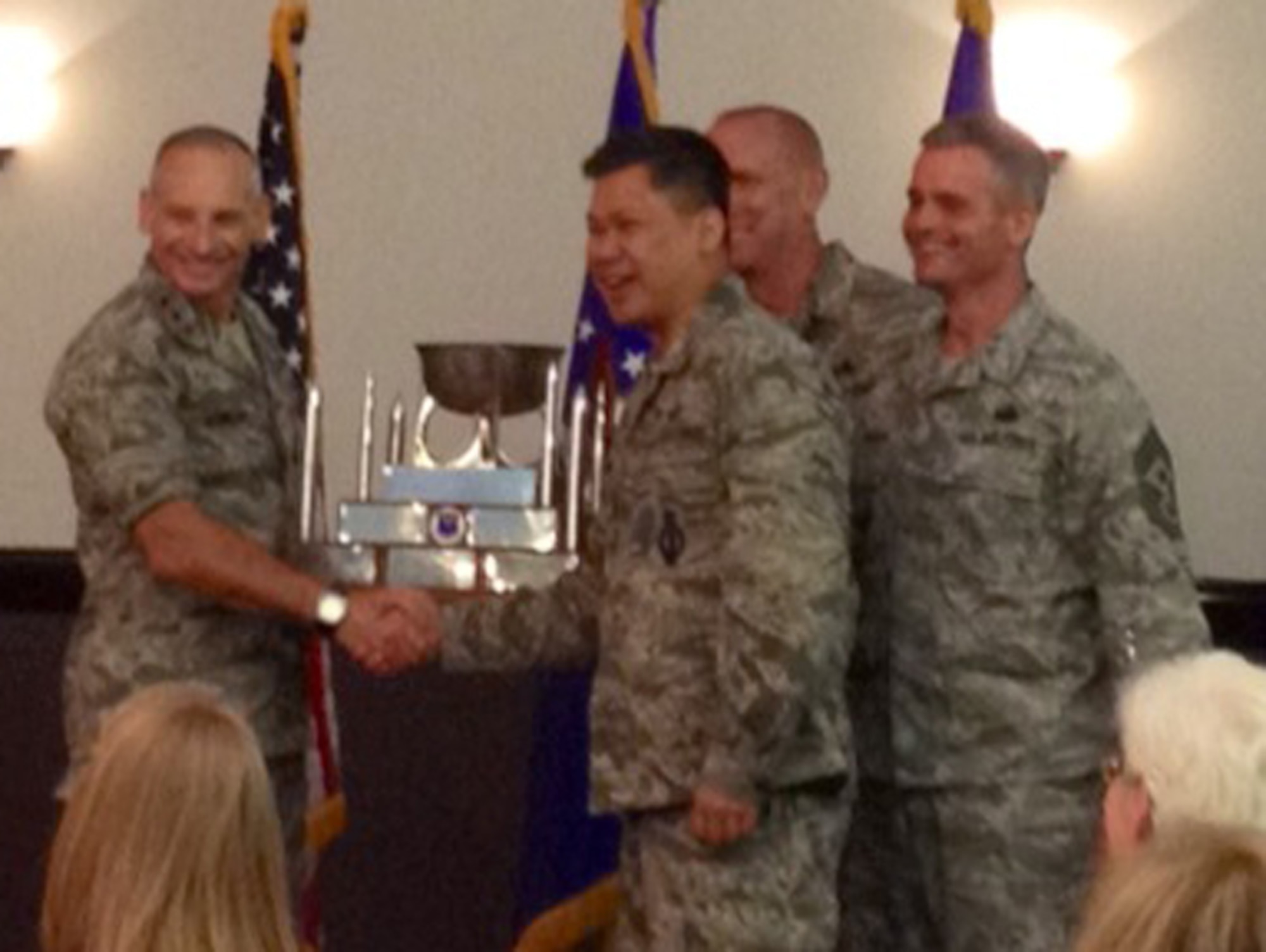 Air Force Global Strike Command Commander Lt. Gen. Jim Kowalski and AFGSC Command Chief Chief Master Sgt. Brian Hornback, presented three trophies to Col. H.B. Brual, 341st Missile Wing Commander and Chief Master Sgt. Chuck Anderson, 341st MW Command Chief, during the AFGSC Commander's Conference at Barksdale Air Force Base, La., earlier this month. The trophies include, from top to bottom, the Col. Lee R. Williams Memorial Award, the Gen. Samuel C. Phillip Award and the Col. Lowell F. McAdoo Award. (U.S. Air Force/courtesy photo)