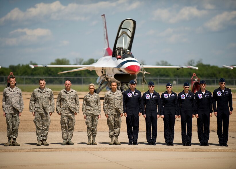 Five Barksdale Airmen are recognized by the U.S. Air Force Thunderbirds during the 2012 Barksdale Air Force Base Defenders of Liberty Air Show April 22. The Airmen were honored in front of the crowd for their actions during recent deployments. (U.S. Air Force photo/Staff Sgt. Chad Warren)(RELEASED)
