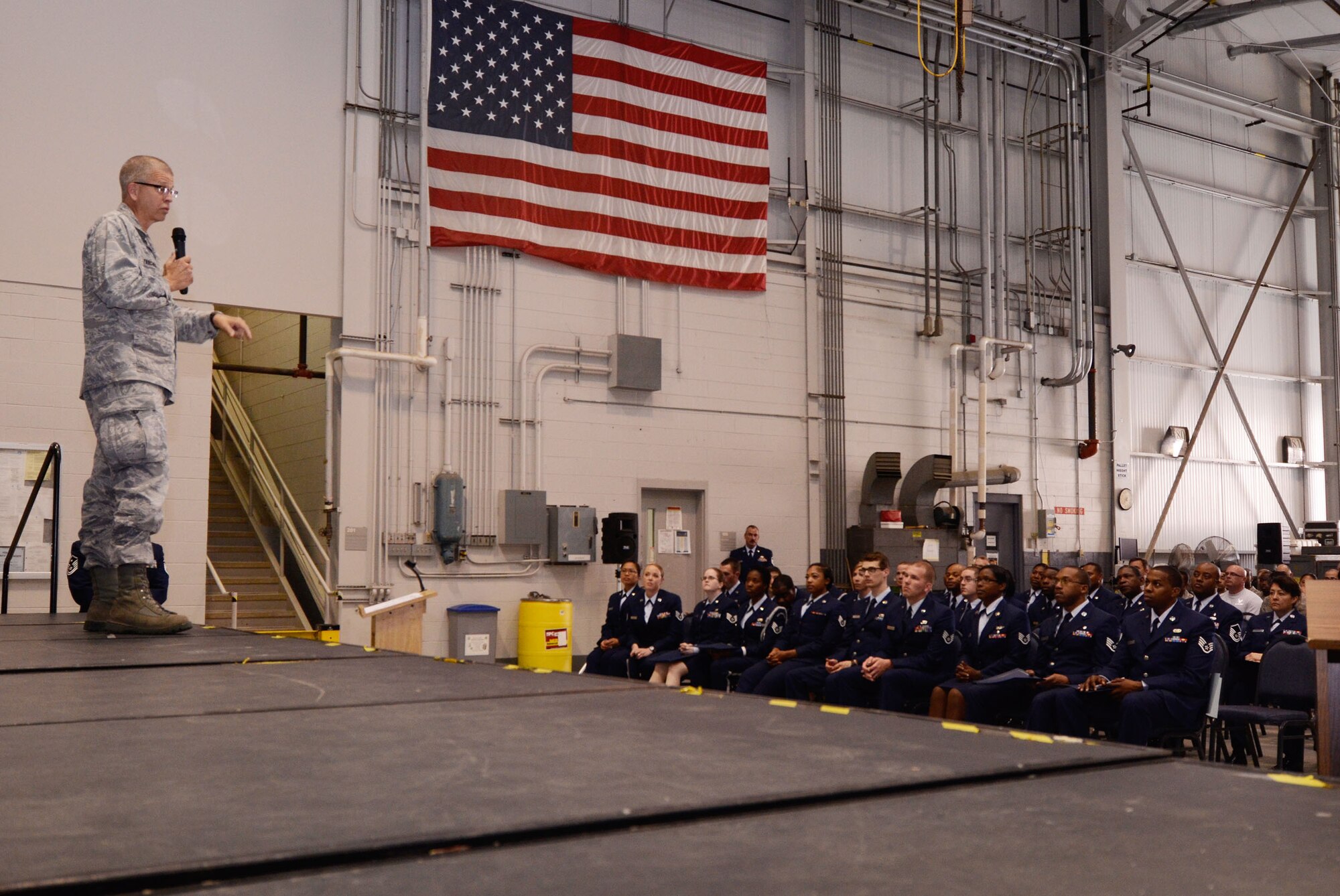 Col. Tim Tarchick, 94th Airlift Wing commander addresses the newly appointed Noncommissioned and Senior Noncommissioned Officers at an induction ceremony April 14. (U.S. Air Force photo/Don Peek)