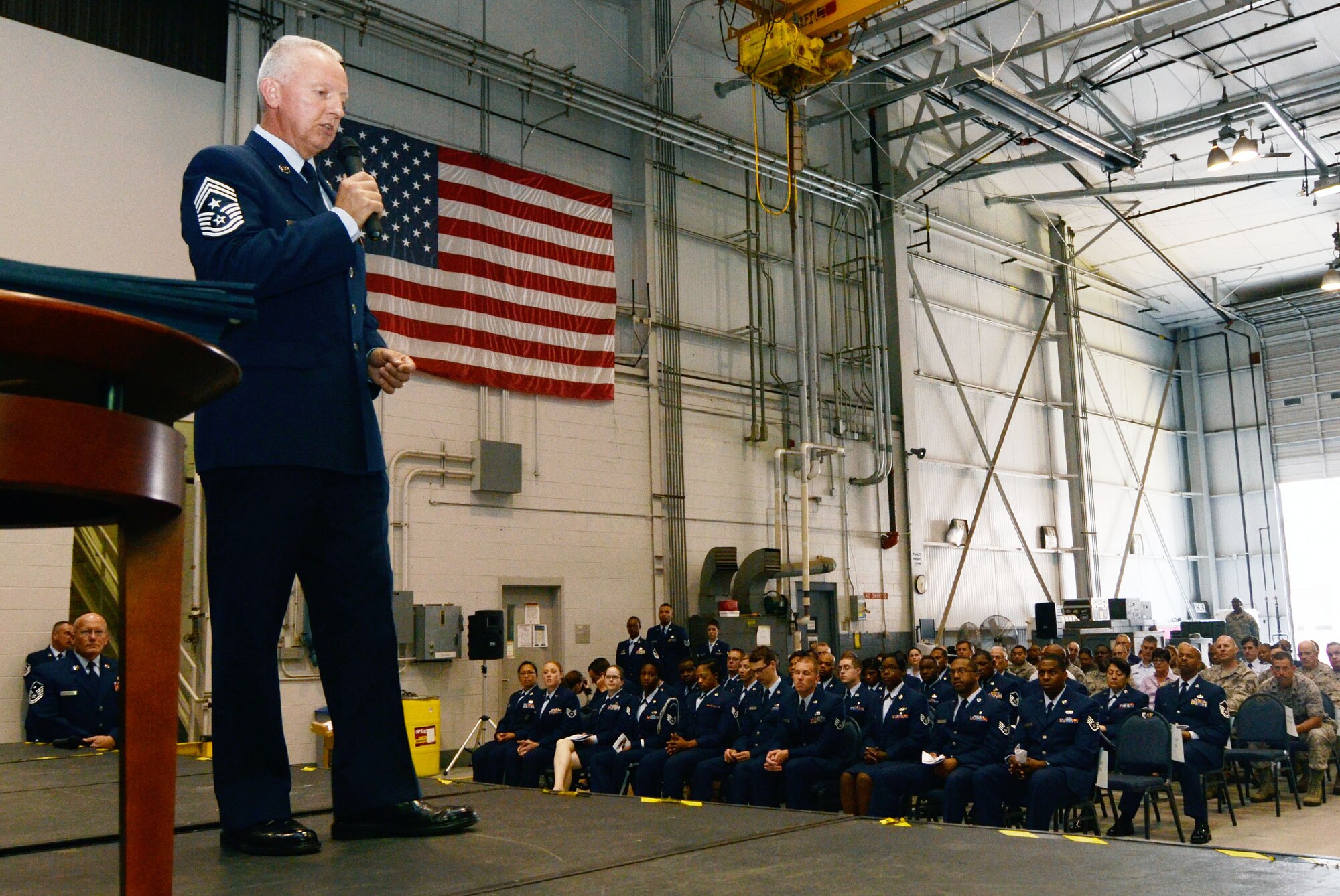Guest Speaker, Chief Master Sgt. Wendell L. Peacock, 94th Airlift Wing, command chief addresses Dobbins newly selected Noncommissioned and Senior Noncommissioned Officers at an induction ceremony April 14. (U.S. Air Force photo/Don Peek)